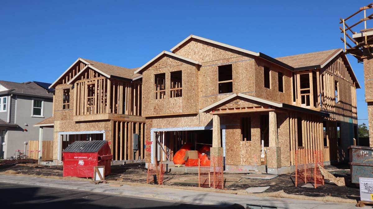 New home under construction with framing in place