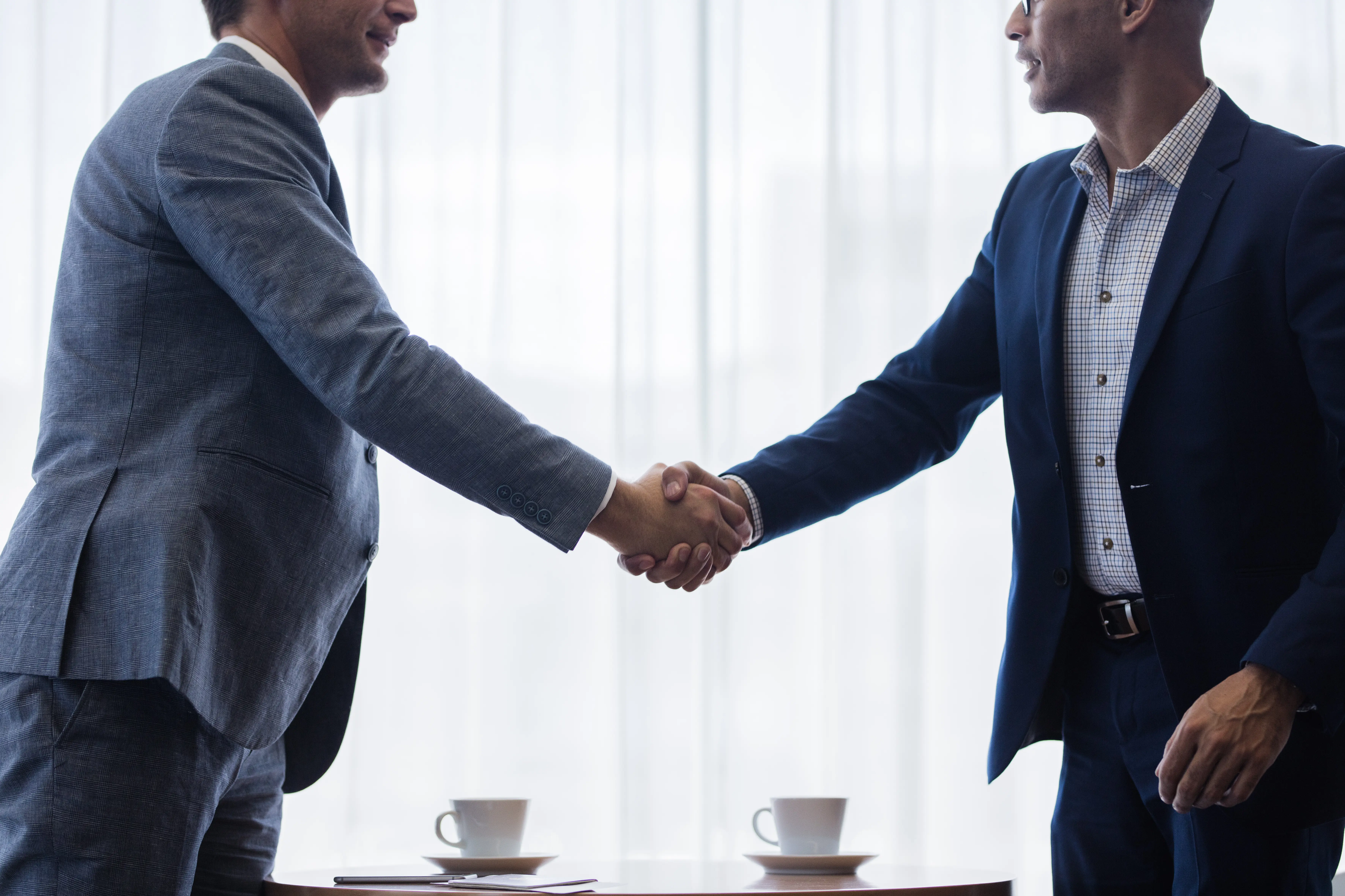 Handshake after agreeing on next steps with a loan officer