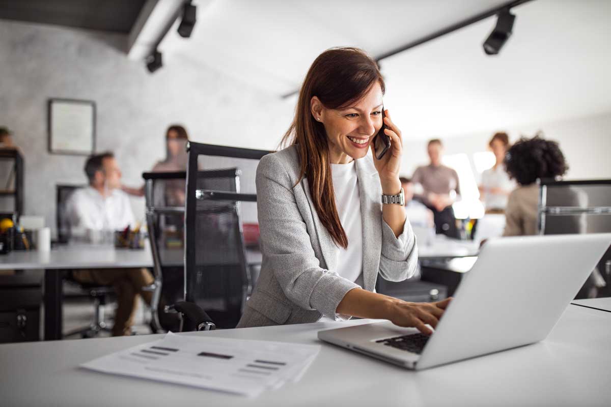 Team member working at a computer in the office