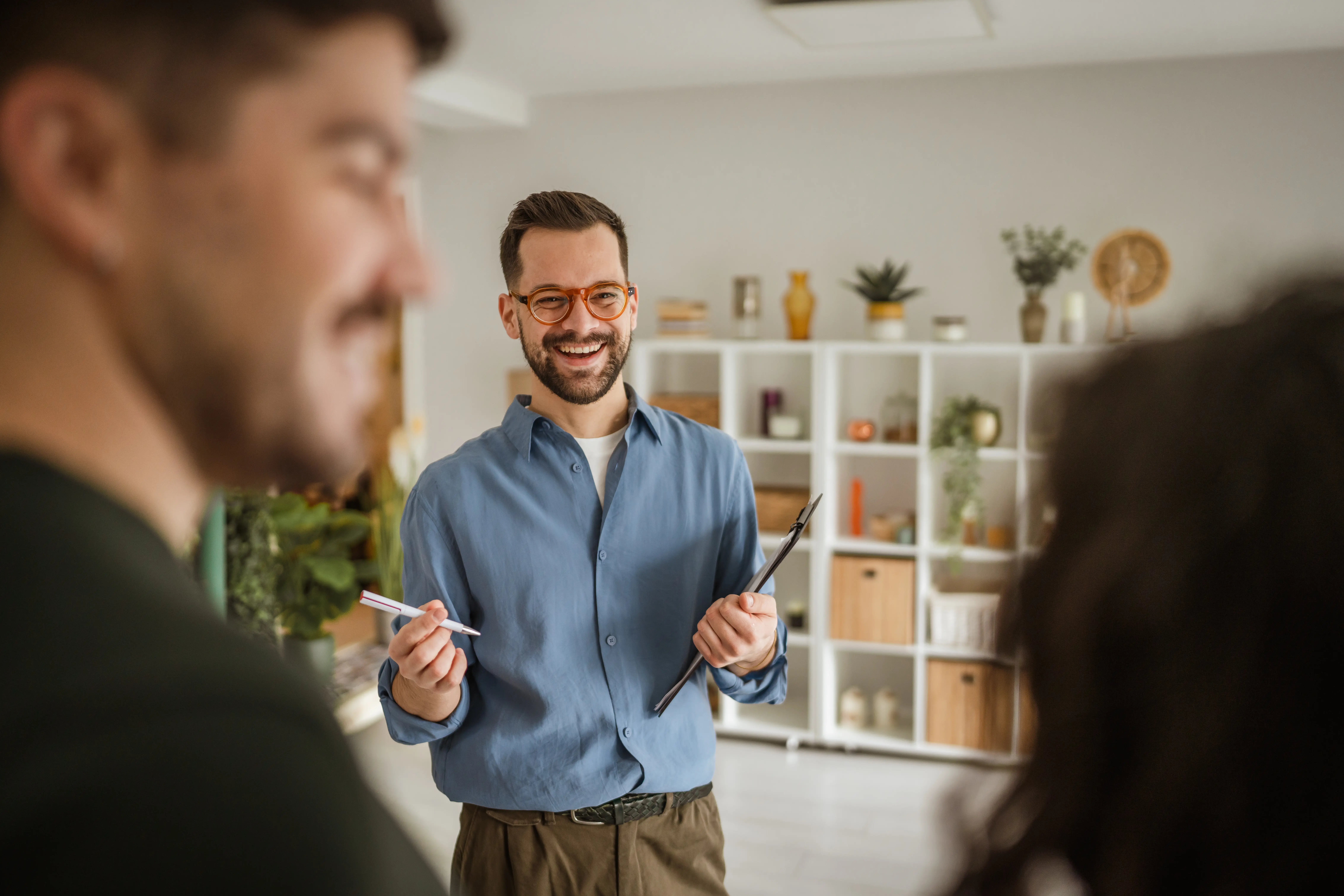 Gold Star Mortgage team members talking in the office
